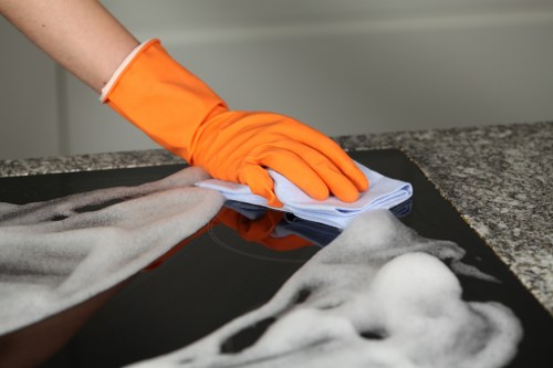 Carpet cleaner preparing equipment safely before a cleaning job