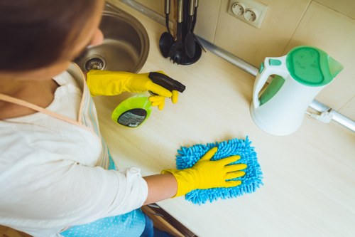 Carpet cleaning technician preparing equipment for a service appointment