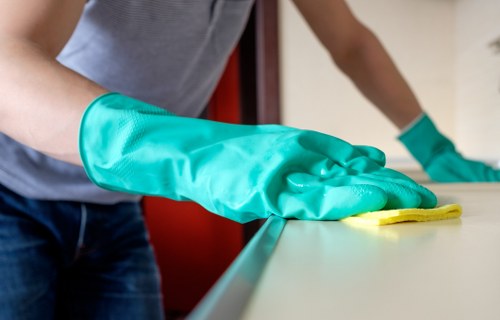Soft furnishing fabric being cleaned carefully during upholstery cleaning in SW12
