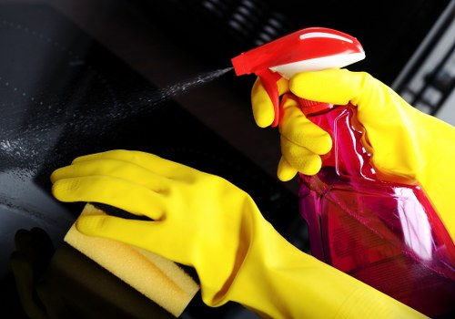 Cleaner in SW12 handling kitchen cleaning tasks in a modern home